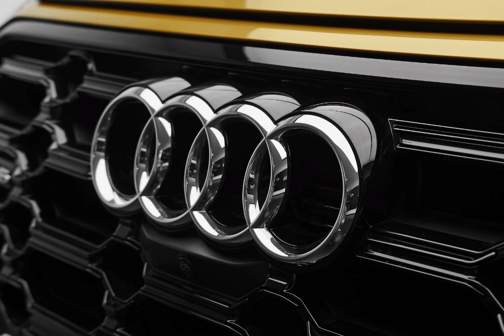 audi transmission repair, auto repair in Bend, OR at Mountain View Imports. Close-up of the iconic Audi logo on the front grille of a vehicle.